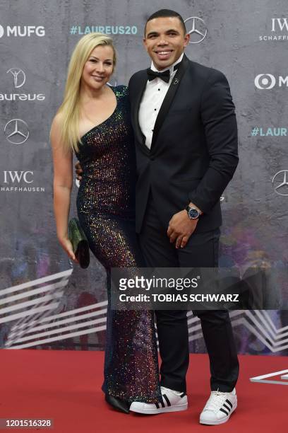 Laureus Academy Member Bryan Habana and his wife Janine Viljoen pose on the red carpet prior to the 2020 Laureus World Sports Awards ceremony in...