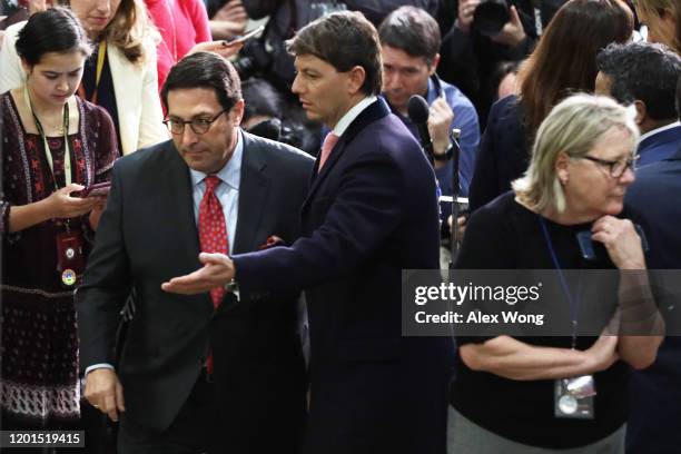 Defense team member and President Donald Trump's personal lawyer Jay Sekulow leaves with White House Deputy Press Secretary Hogan Gidley after he...