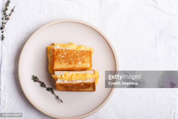 scrambled eggs sandwich - sandwich top view stock pictures, royalty-free photos & images