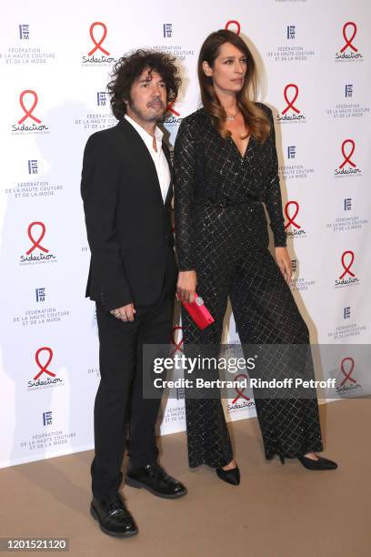 Yarol Poupaud and Caroline de Maigret attends the Sidaction Gala Dinner 2020 at Pavillon Cambon on January 23, 2020 in Paris, France.