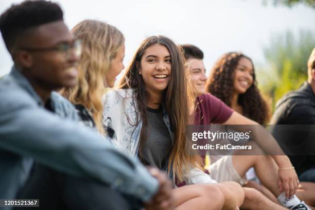 casual post secondary students outside stock photo - teenager stock pictures, royalty-free photos & images