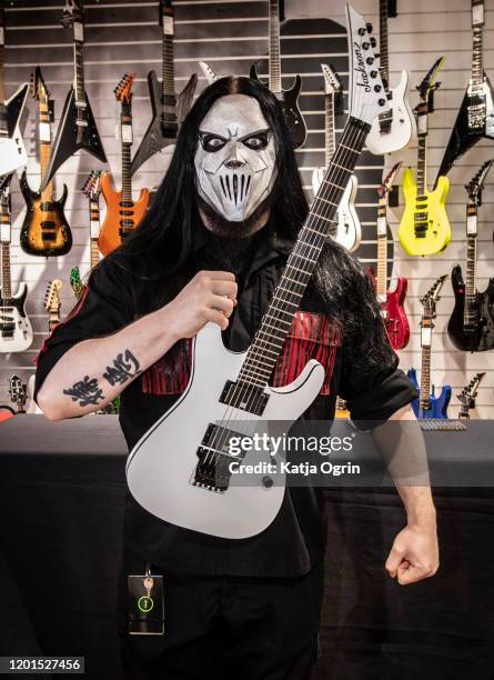 Slipknot's guitarist Mick Thomson attends fan signing event at GuitarGuitar store on January 23, 2020 in Birmingham, England.
