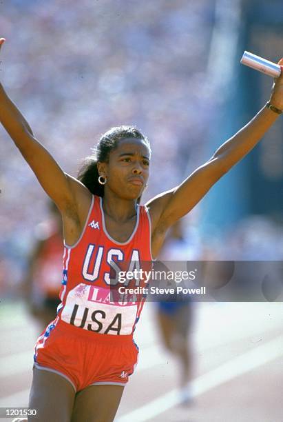 Evelyn Ashford of the USA anchors her team to victory in the 4 x 100 metres Relay event during the 1984 Olympic Games at the Coliseum Stadium in Los...