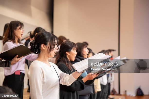 rehearsal of women's chorus concert - choir imagens e fotografias de stock