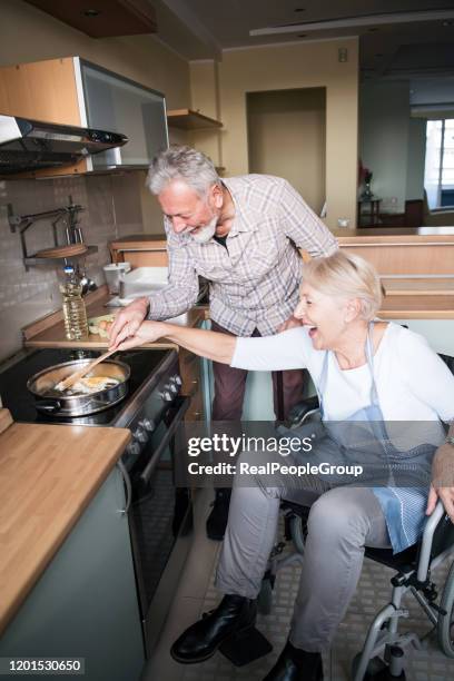 Disabled Cooking People With Disabilities Cooking Photos and Premium High Res Pictures ...