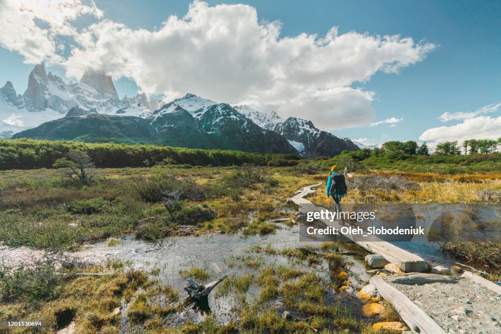 Woman hiking near Fitz Roy mountain in Patagonia