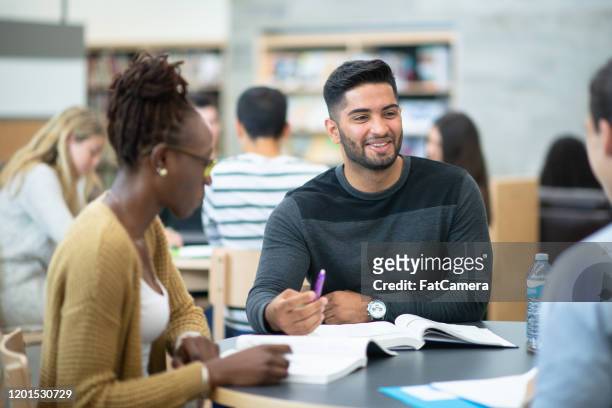 post secondary students studying stock photo - democracy book stock pictures, royalty-free photos & images