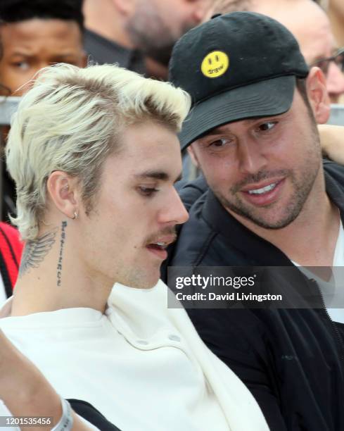 Justin Bieber and Scooter Braun attend Sir Lucian Grainge honored with a Star on the Hollywood Walk of Fame on January 23, 2020 in Hollywood,...