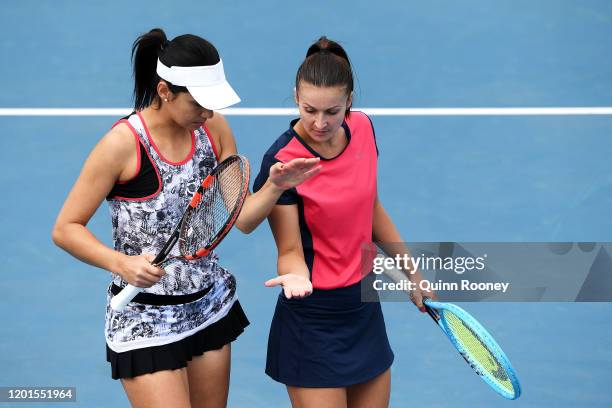 Dalila Jakupovic of Slovenia and Raluca Olaru of Romania play in their Women's Doubles first round match against Timea Babos of Hungary and Kristina...