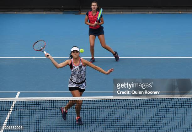 Dalila Jakupovic of Slovenia and Raluca Olaru of Romania play in their Women's Doubles first round match against Timea Babos of Hungary and Kristina...