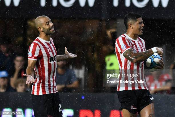 Javier Mascherano and Marcos Rojo of Estudiantes react during a match between Estudiantes and Defensa y Justicia as part of Superliga 2019/20 at...