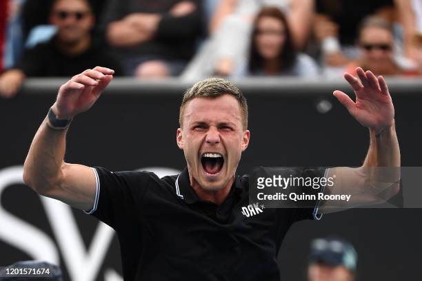 Marton Fucsovics of Hungary celebrates after winning match point during his Men's Singles third round match against Tommy Paul of the United States...