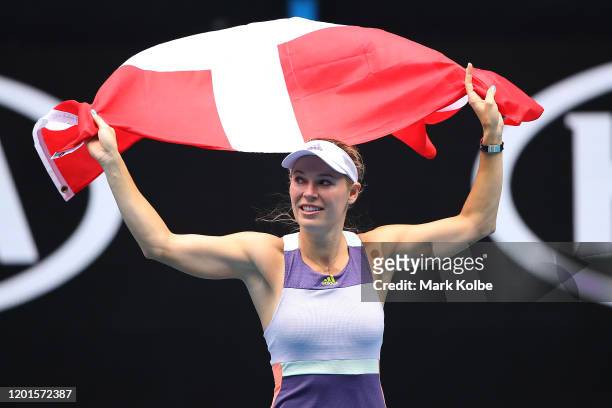 Caroline Wozniacki of Denmark acknowledges the crowd following her Women's Singles third round match against Ons Jabeur of Tunisia on day five of the...