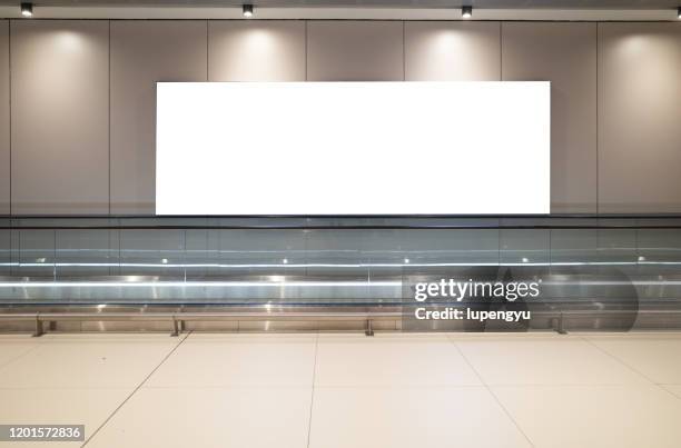 blank billboard at airport - pedestrian walkway 個照片及圖片檔