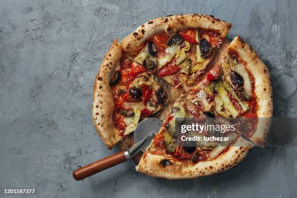 homemade vegan artichoke and olive pizza - pizza directly above stock pictures, royalty-free photos & images