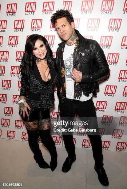 Adult film actress/director Joanna Angel and her husband, adult film actor Small Hands, pose at the AVN Stars booth during the 2020 AVN Adult Expo at...