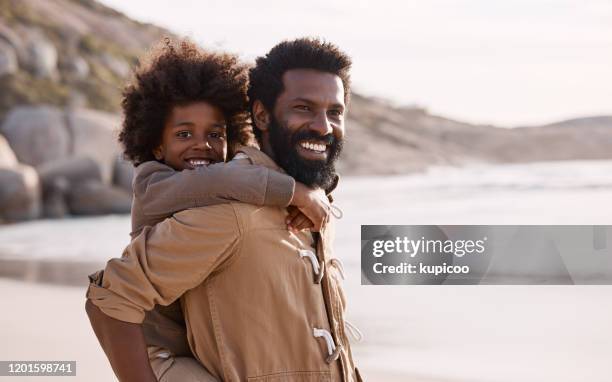 i make time for my little man - black dad and son beach stock pictures, royalty-free photos & images