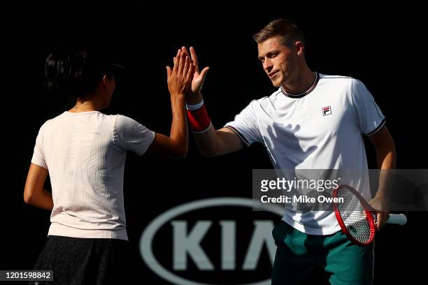 Su-Wei Hsieh of Taiwan and Neal Skupski of Great Britain play in their Mixed Doubles first round match against Desirae Krawczyk of the United States...