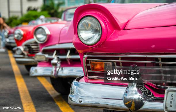 concept of cuba attractions. headlight of old car in havana, cuba - classic car restoration stockfoto's en -beelden