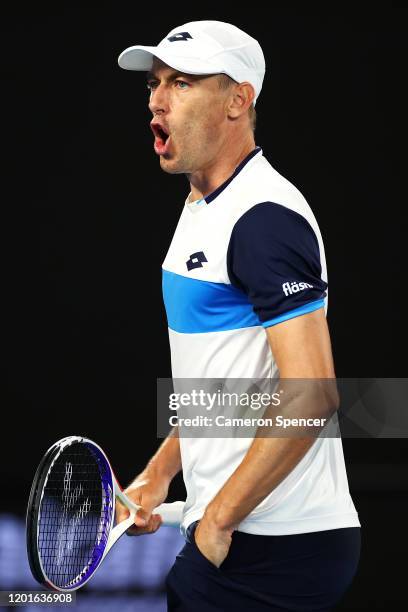 John Millman of Australia celebrates after winning a point during his Men's Singles third round match against Roger Federer of Switzerland on day...