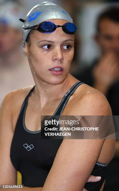 La championne olympique du 400 m nage libre Laure Manaudou est photographiée lors d'une séance d'échauffement pendant les championnats de France de...