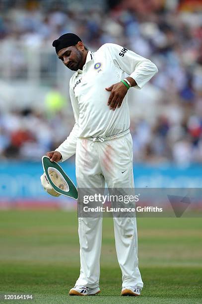 Harbhajan Singh of India streches shortly before leaving the field with injury during the second npower Test match between England and India at Trent...