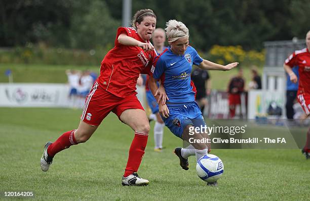 Jess Fishlock of Bristol Academy Women's FC in action with Emma Jones of Liverpool Ladies FC during the Womens Super League match between Liverpool...