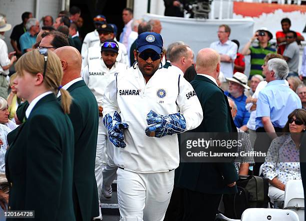 Donhi of India emerges after tea after allowing Ian Bell of England to be re instated in the spirit of the game after being given run out on the...