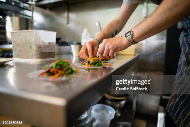 preparation in the vegan cafe - making a sandwich stock pictures, royalty-free photos & images