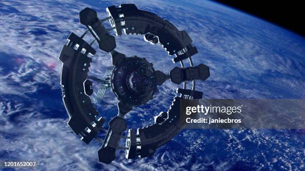 estação espacial na órbita do planeta terra. exploração espacial. - estação espacial internacional - fotografias e filmes do acervo