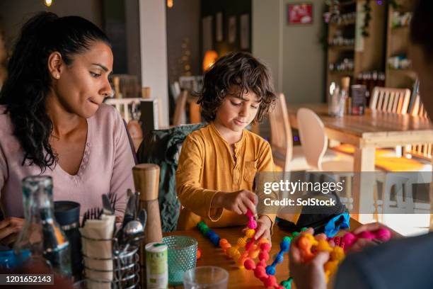 enriching childhood at a meal - behavioral enrichment stock pictures, royalty-free photos & images