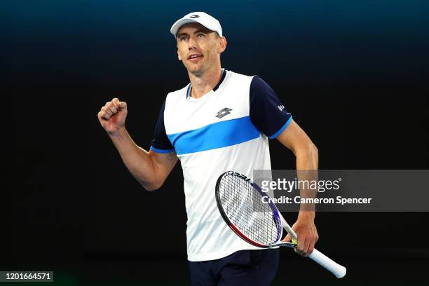 John Millman of Australia celebrates after winning a point during his Men's Singles third round match against Roger Federer of Switzerland on day...