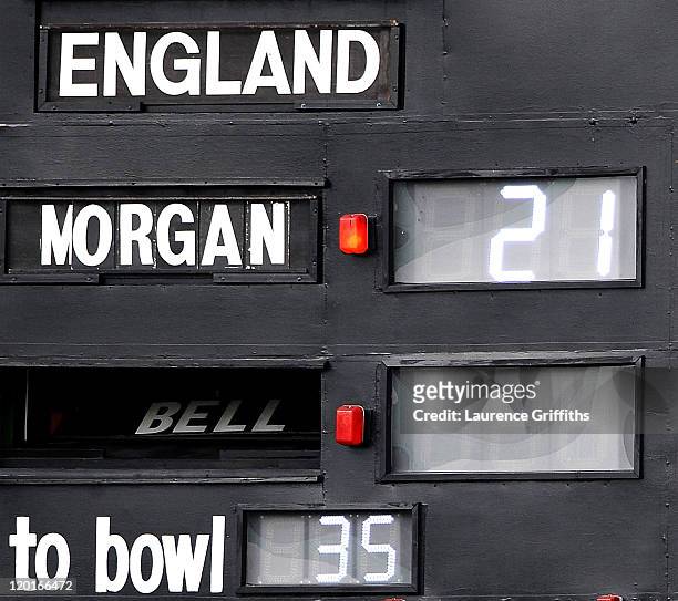 The scoreboard operators put back in the name of Ian Bell of England after he is re instated in the spirit of the game after being given run out on...