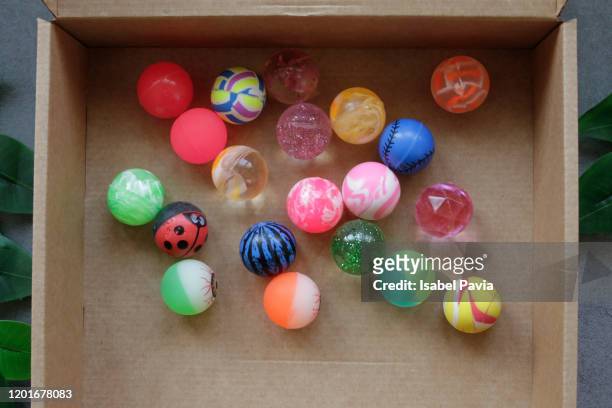 toy balls in box - bouncing ball stockfoto's en -beelden