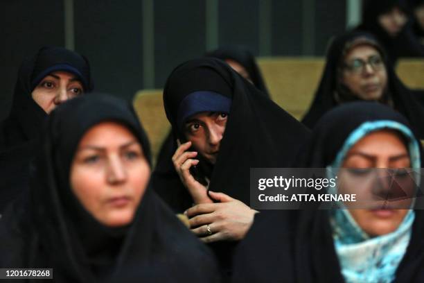 Iranian women attend a campaign meeting of candidate Mohammad Bagher Ghalibaf, a former military officer and mayor of Tehran, in the Iranian capital...