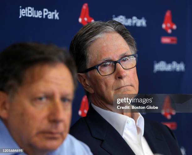 Boston Red Sox executives, from left, Tom Werner and John Henry meet with the media in the dining room at Jet Blue Park in Fort Myers, FL on Feb. 17,...