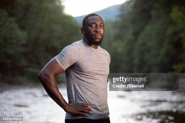 man enjoying the outdoors in a beautiful setting - gifford pinchot national forest stock pictures, royalty-free photos & images