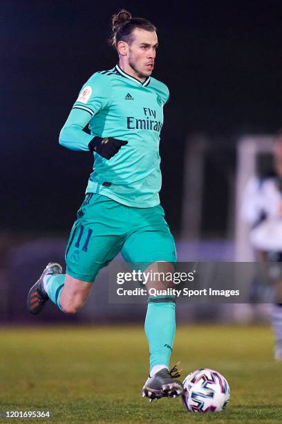 Gareth Bale of Real Madrid CF runs with the ball during the Copa del Rey round of 32 match between Unionistas CF and Real Madrid CF at stadium of Las...