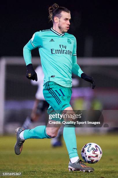 Gareth Bale of Real Madrid CF runs with the ball during the Copa del Rey round of 32 match between Unionistas CF and Real Madrid CF at stadium of Las...