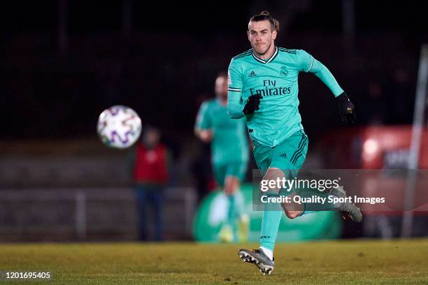 Gareth Bale of Real Madrid CF runs with the ball during the Copa del Rey round of 32 match between Unionistas CF and Real Madrid CF at stadium of Las...