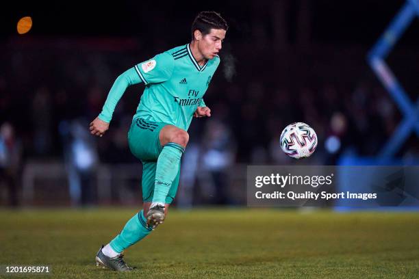 James Rodriguez of Real Madrid CF runs with the ball during the Copa del Rey round of 32 match between Unionistas CF and Real Madrid CF at stadium of...