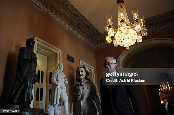 Sen. Bob Corker and Sen. Kay Bailey Hutchison arrive on Capitol Hill for a postponed vote on the debt ceiling on July 31, 2011 in Washington, DC. As...