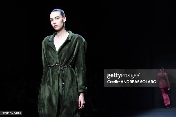 Model presents a creation for Chinese designer Han Wen's Fall - Winter 2020 collection, as part of the "China, We are With You" fashion event,...