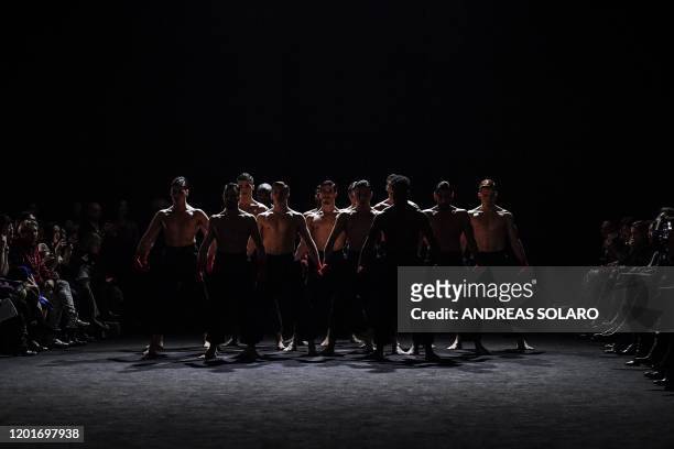 Dancers perform prior to the presentation of Chinese designer Han Wen's Fall - Winter 2020 fashion collection, as part of the "China, We are With...