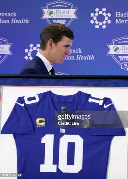 Eli Manning of the New York Giants heads to the podium to announce his retirement during a press conference on January 24, 2020 at Quest Diagnostic...