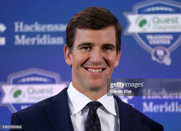 Eli Manning of the New York Giants smiles after a press conference announcing his retirement on January 24, 2020 at Quest Diagnostic Training Center...