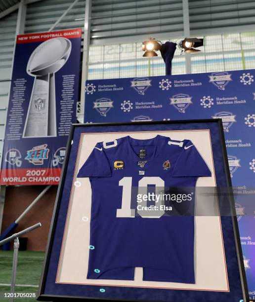 The jersey of Eli Manning of the New York Giants is on display with the Vince Lombardi trophies before Eli Manning announced his retirement during a...