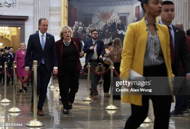 House impeachment managers Rep. Sylvia Garcia , Rep. Adam Schiff and Rep. Zoe Lofgren pass through the Rotunda to go to the Senate side for the...