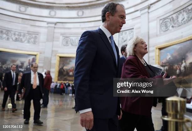 House impeachment managers Rep. Rep. Adam Schiff and Rep. Zoe Lofgren pass through the Rotunda to go to the Senate side for the Senate impeachment...