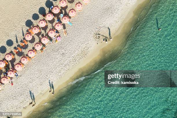 aerial view of beach in italy with parasols - amalfi umbrella stock pictures, royalty-free photos & images